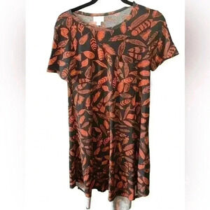 XS Lularoe Carly dress with feathers.NWT. Hi/lo hem, swing style.grey background